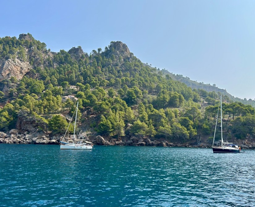 Boats and view of mountains and Mallorca coastline
